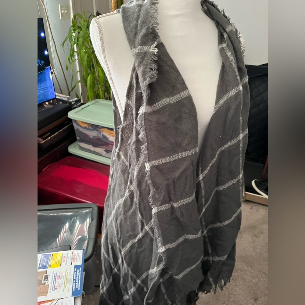 Francesca’s sleeveless cardigan